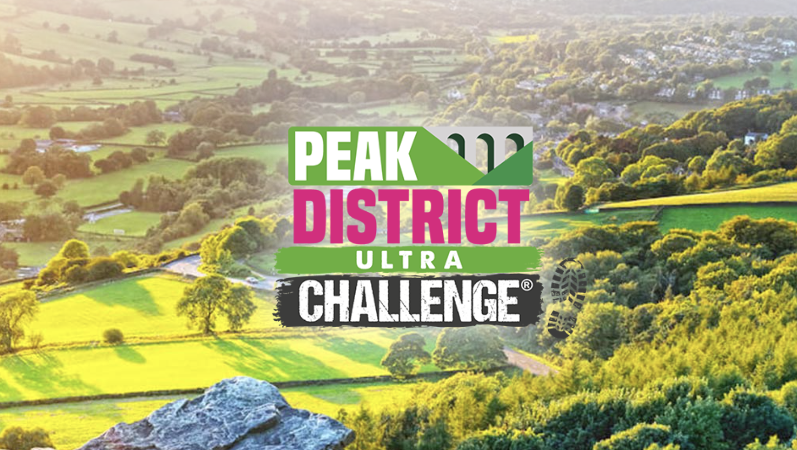 Stunning landscape of the Peak District with sunlit fields, scattered trees, and rocky outcrops in the foreground. Villages and rolling hills are visible in the distance under soft, golden light. The Peak District Ultra Challenge logo is prominently displayed over the image.